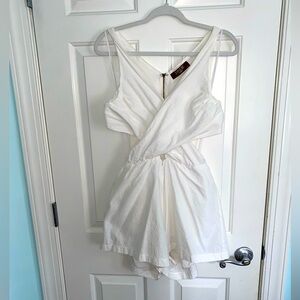 White cross strap romper from Jondie Boutique